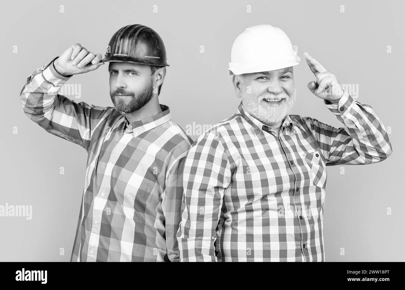 Yellow workman helmet Black and White Stock Photos & Images - Alamy
