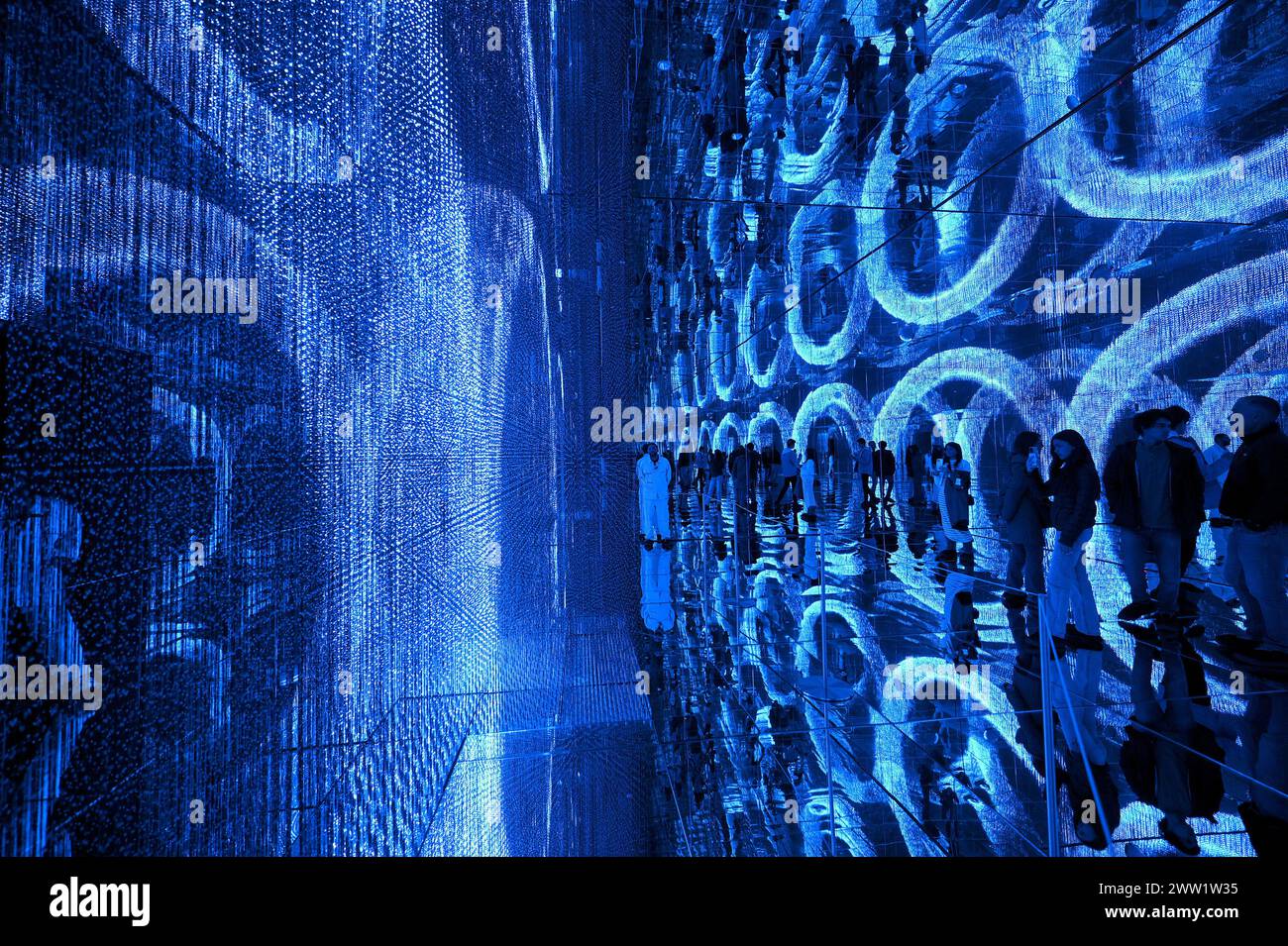 New York, USA. 20th Mar, 2024. Visitors walk through an installation at ...