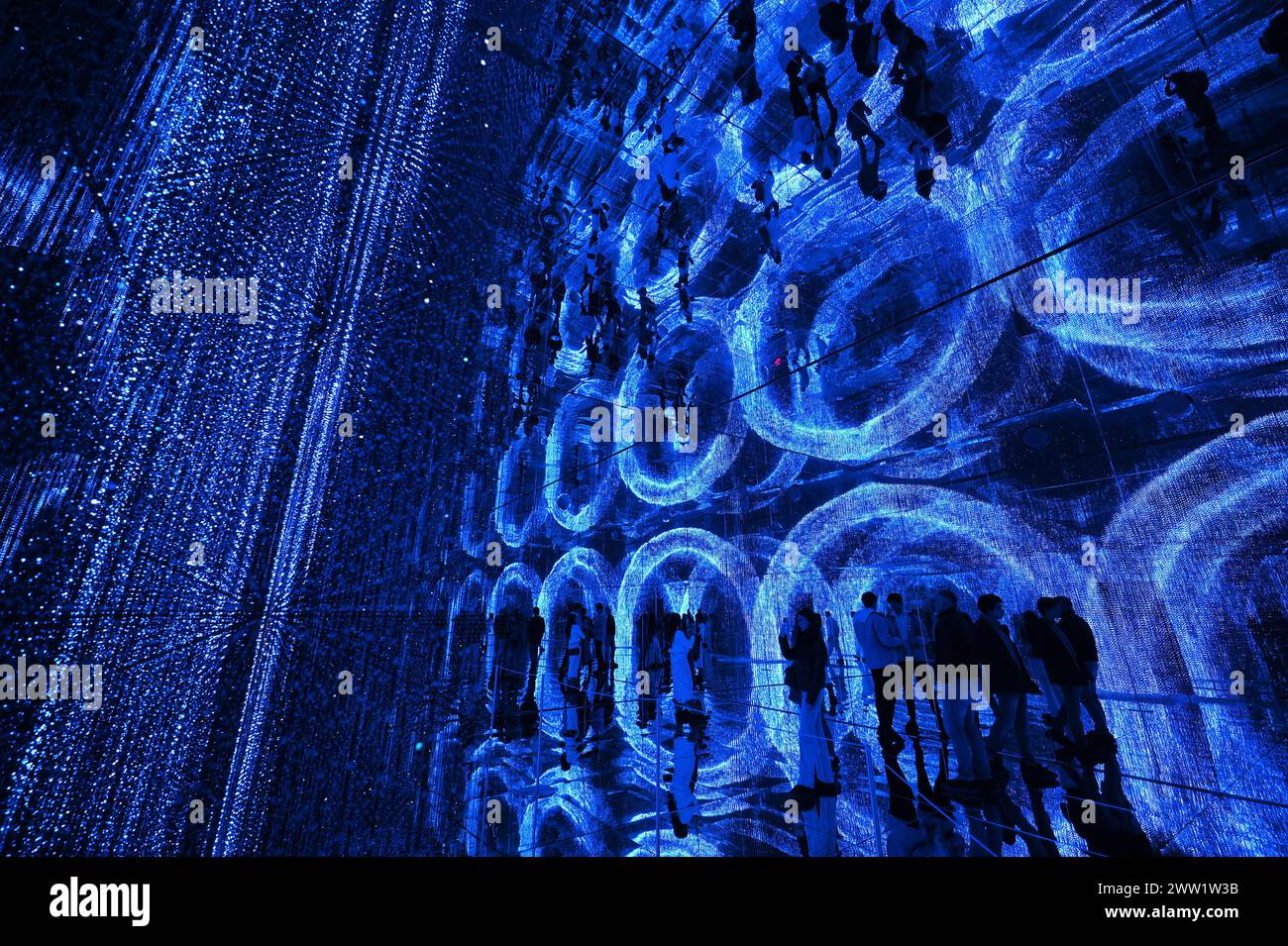New York, USA. 20th Mar, 2024. Visitors walk through an installation at ...