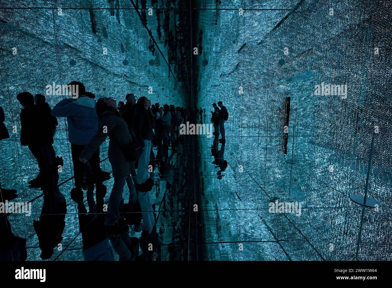 New York, USA. 20th Mar, 2024. Visitors walk through an installation at ...