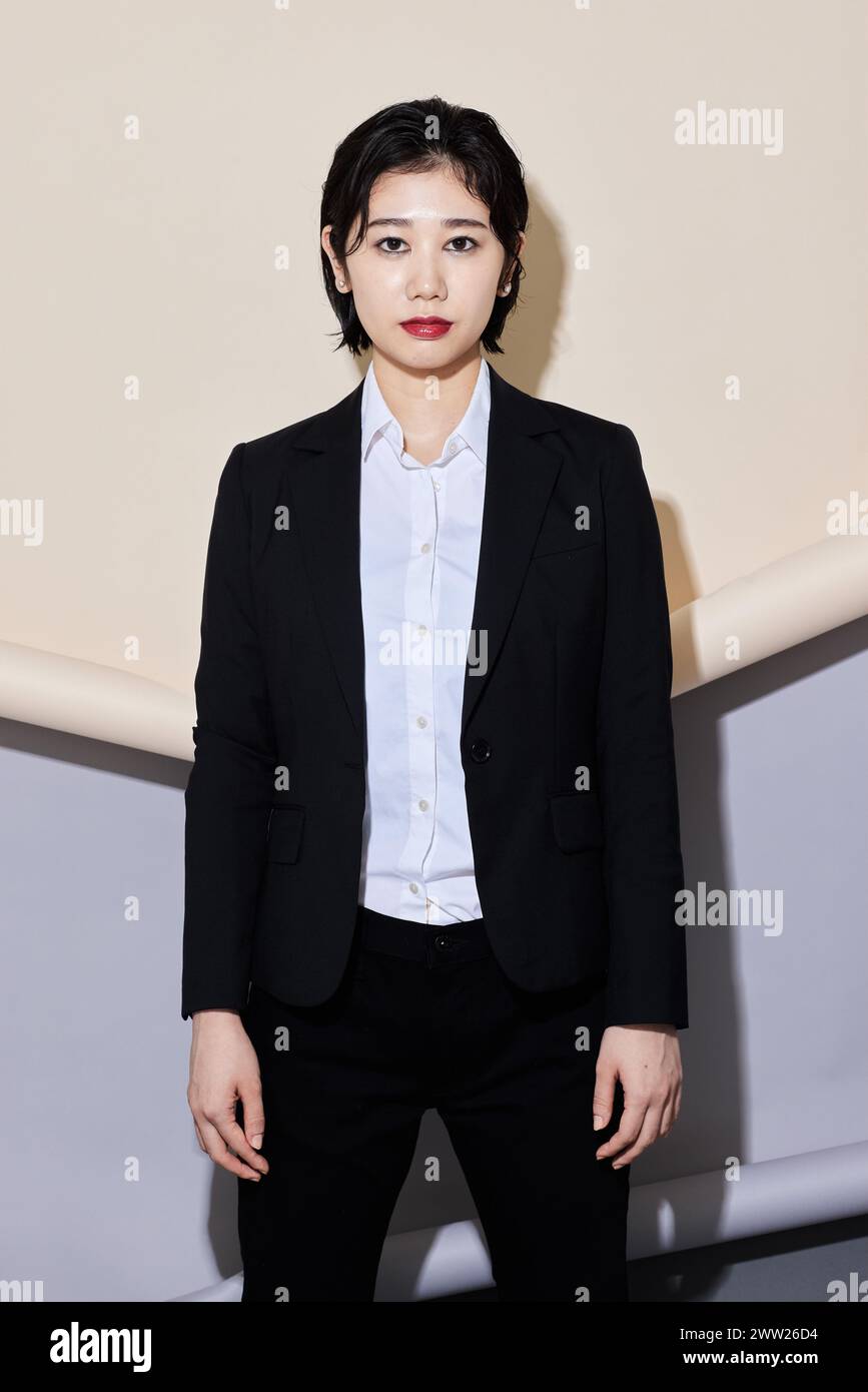 Black business woman suit hi-res stock photography and images - Alamy