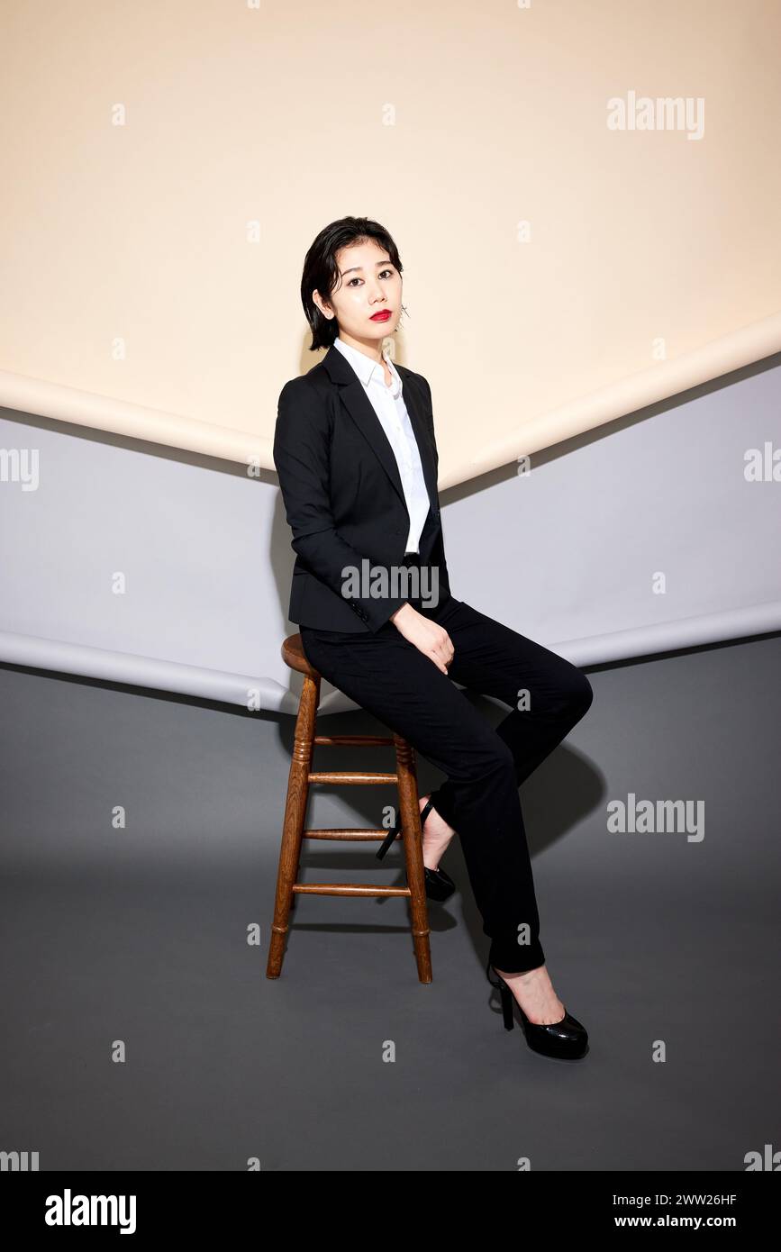 Woman in a suit hi-res stock photography and images - Alamy