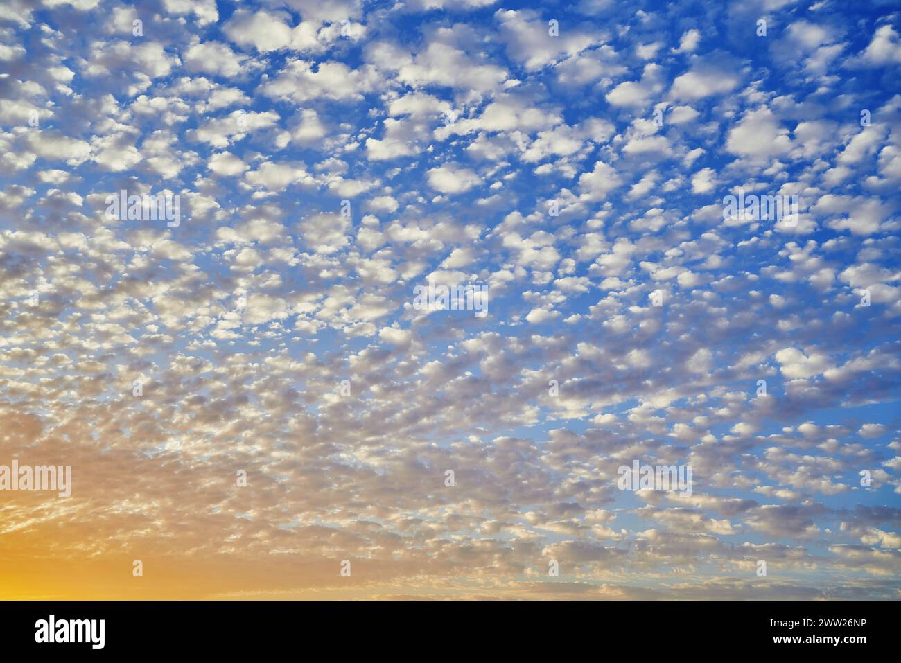 dramatic sunset over the sea with clouds Stock Photo