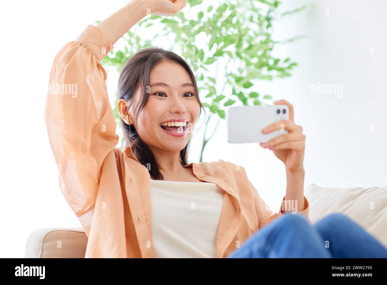 Happy young asian woman taking hi-res stock photography and images - Alamy