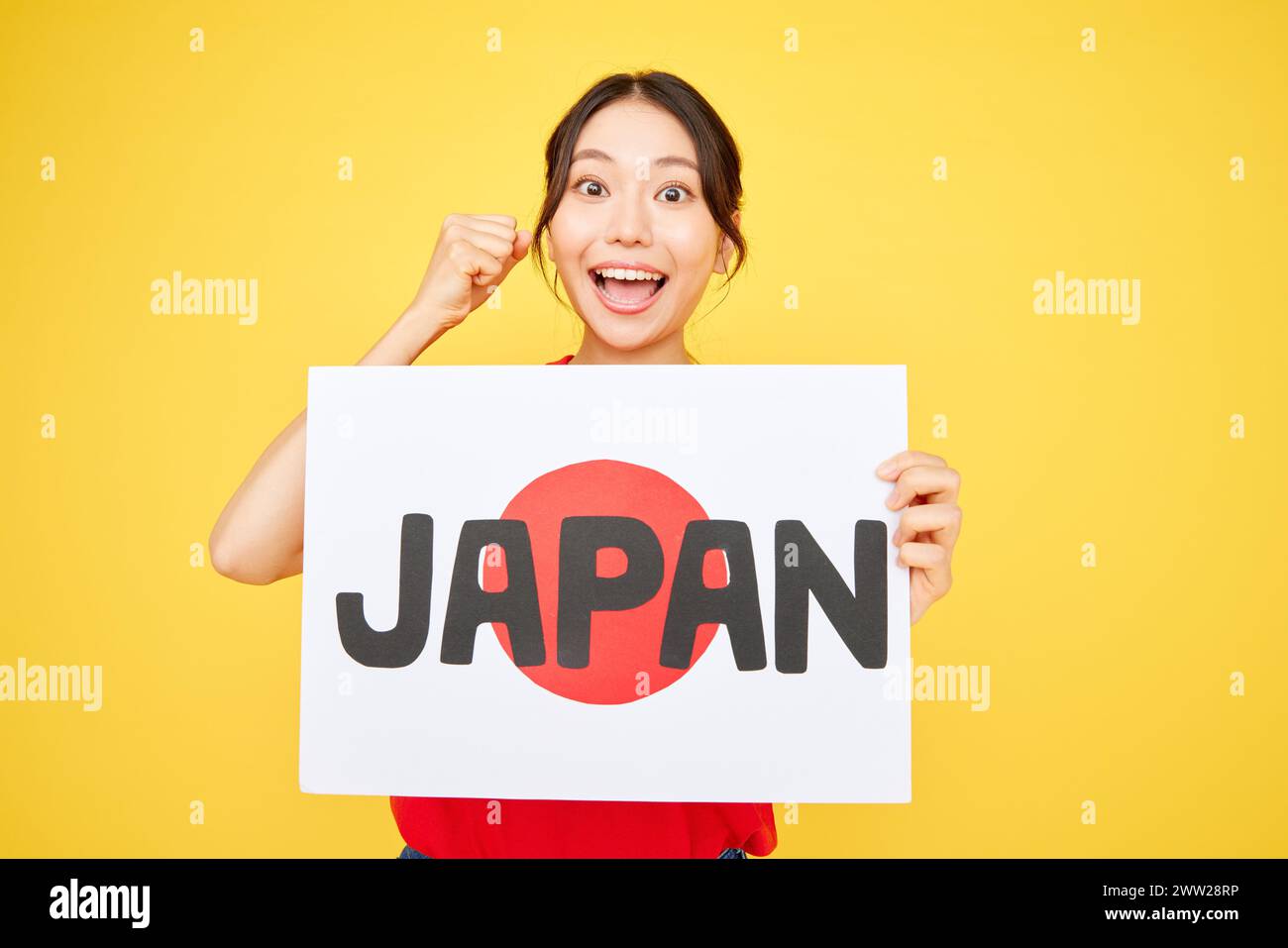 Asian woman holding Japan sign Stock Photo