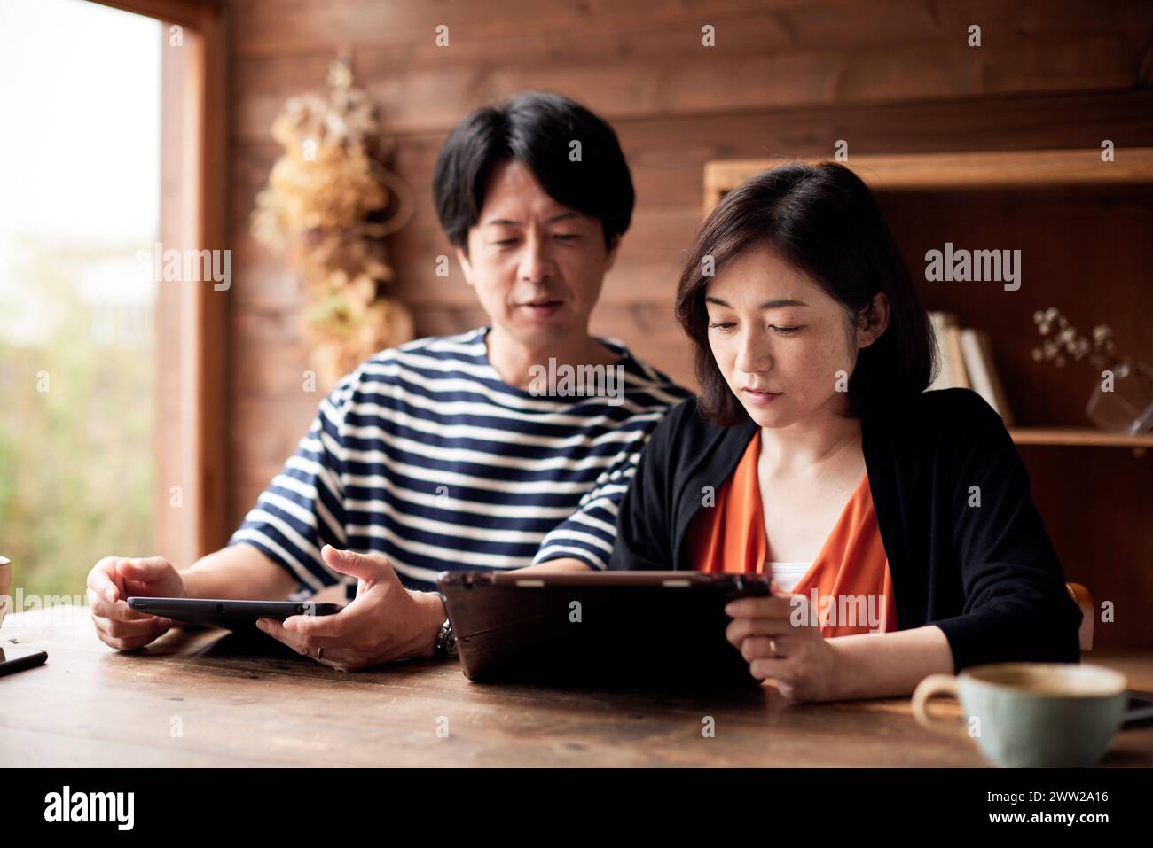 Asian couple home hi-res stock photography and images - Alamy