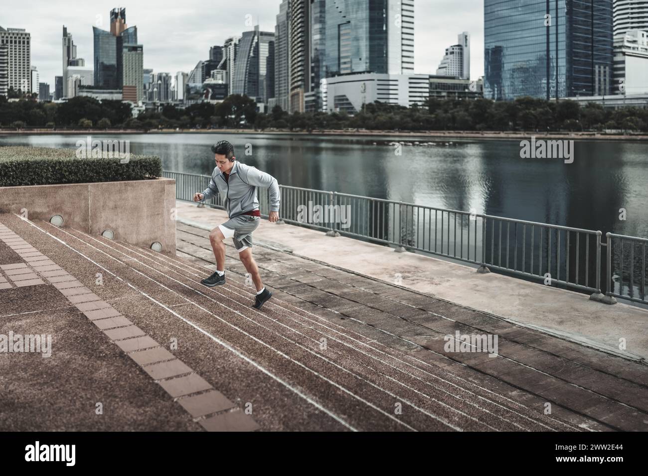 Man running up bridge stairs hi-res stock photography and images - Alamy