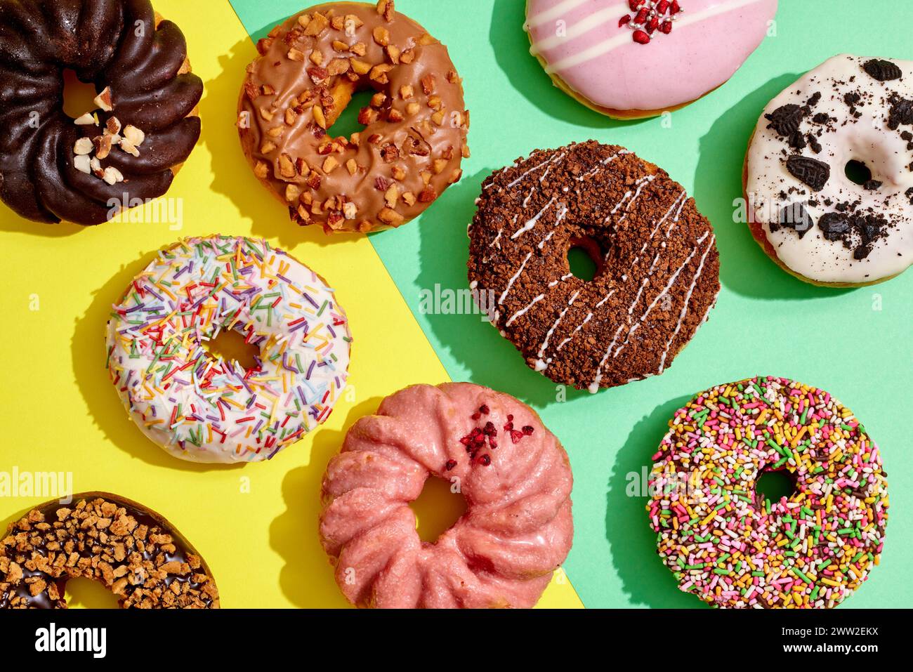 Donuts on a yellow and green background Stock Photo