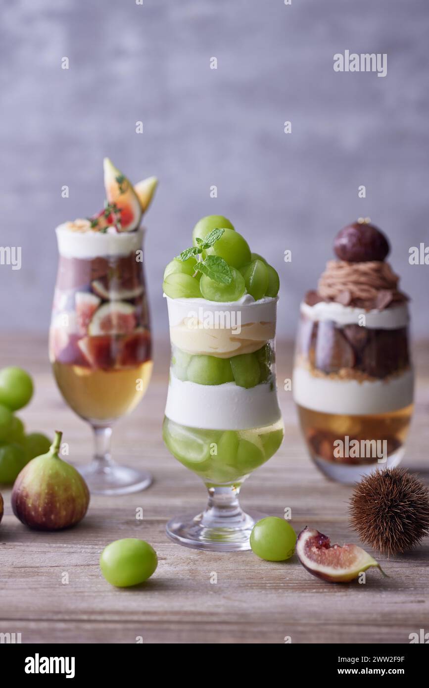 Three different desserts in glasses Stock Photo