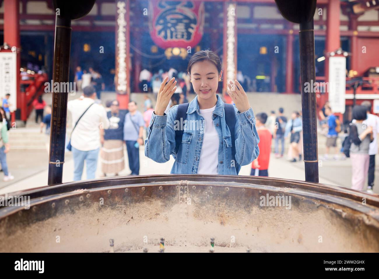 Asian woman at the temple Stock Photo