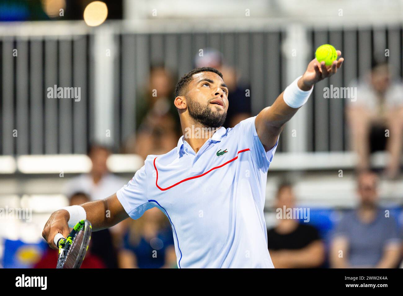 MIAMI GARDENS, FLORIDA - MARCH 20: Arthur Fils of France serves against Matteo Arnaldi of Italy during their match on Day 5 of the Miami Open at Hard Rock Stadium on March 20, 2024 in Miami Gardens, Florida. (Photo by Mauricio Paiz) Stock Photo
