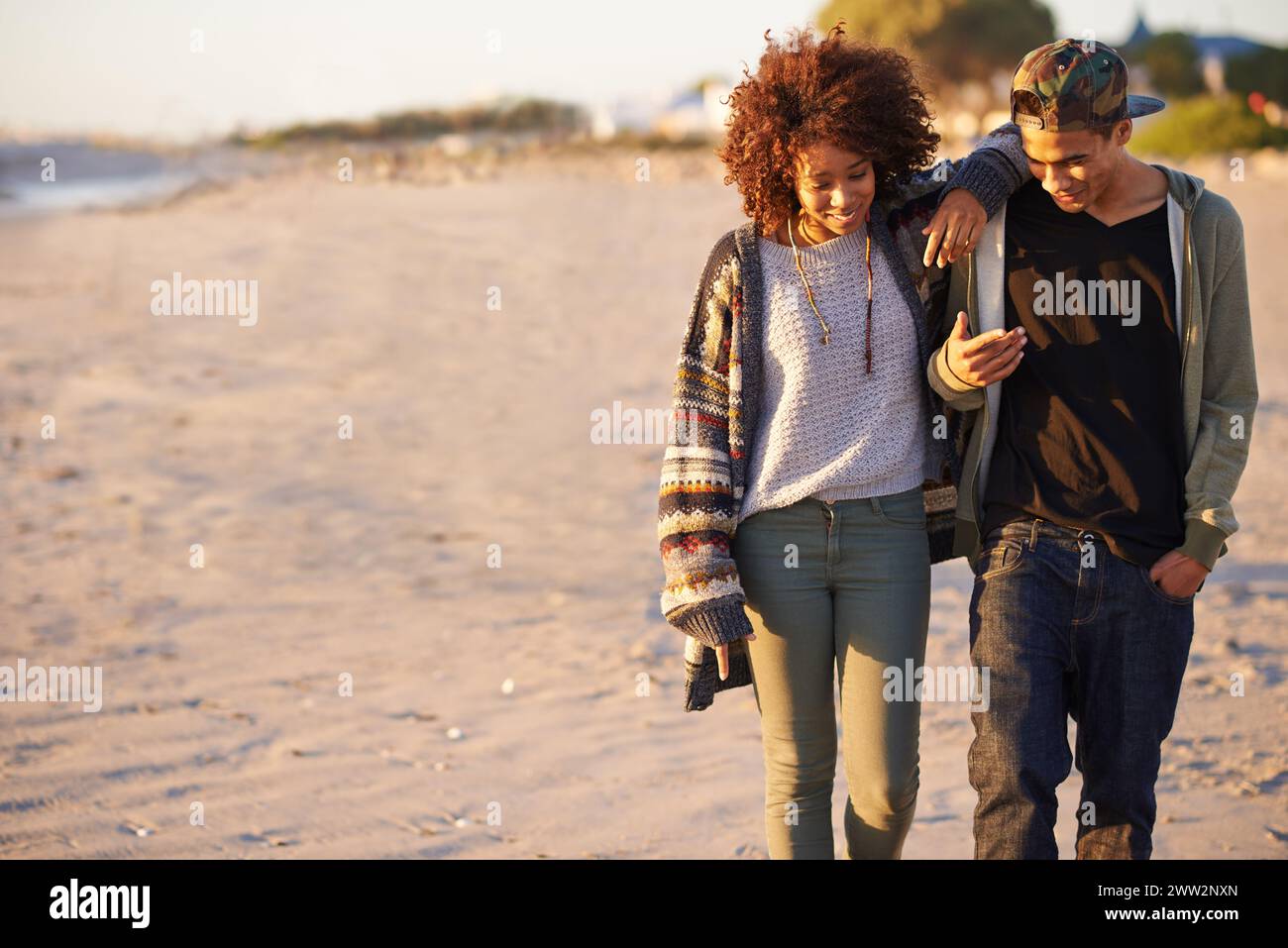 Couple, walking and conversation together on beach, sunset with gen z ...
