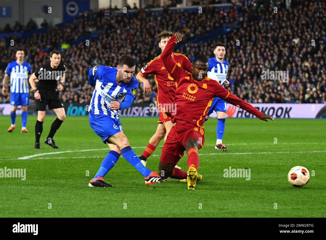 Pascal Gross of Brighton and Hove Albion shoots - Brighton & Hove Albion v Roma, UEFA Europa League. Round of 16, Amex Stadium, Brighton, UK - 14th March 2024 Stock Photo