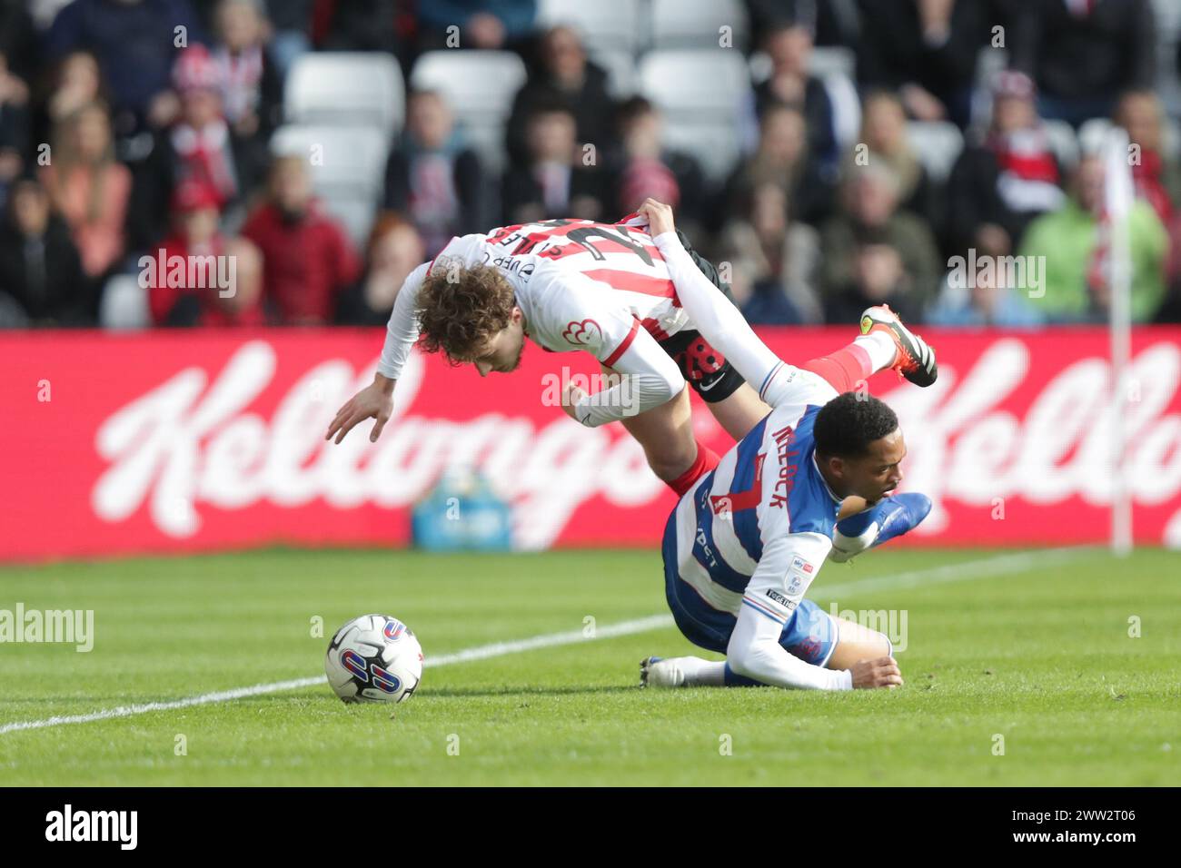 Callum Styles of Sunderland tackles  Chris Willock of Queens Park Rangers - Sunderland v Queens Park Rangers, Sky Bet Championship, Stadium of Light, Sunderland, UK - 16th March 2024 Editorial Use Only - DataCo restrictions apply Stock Photo