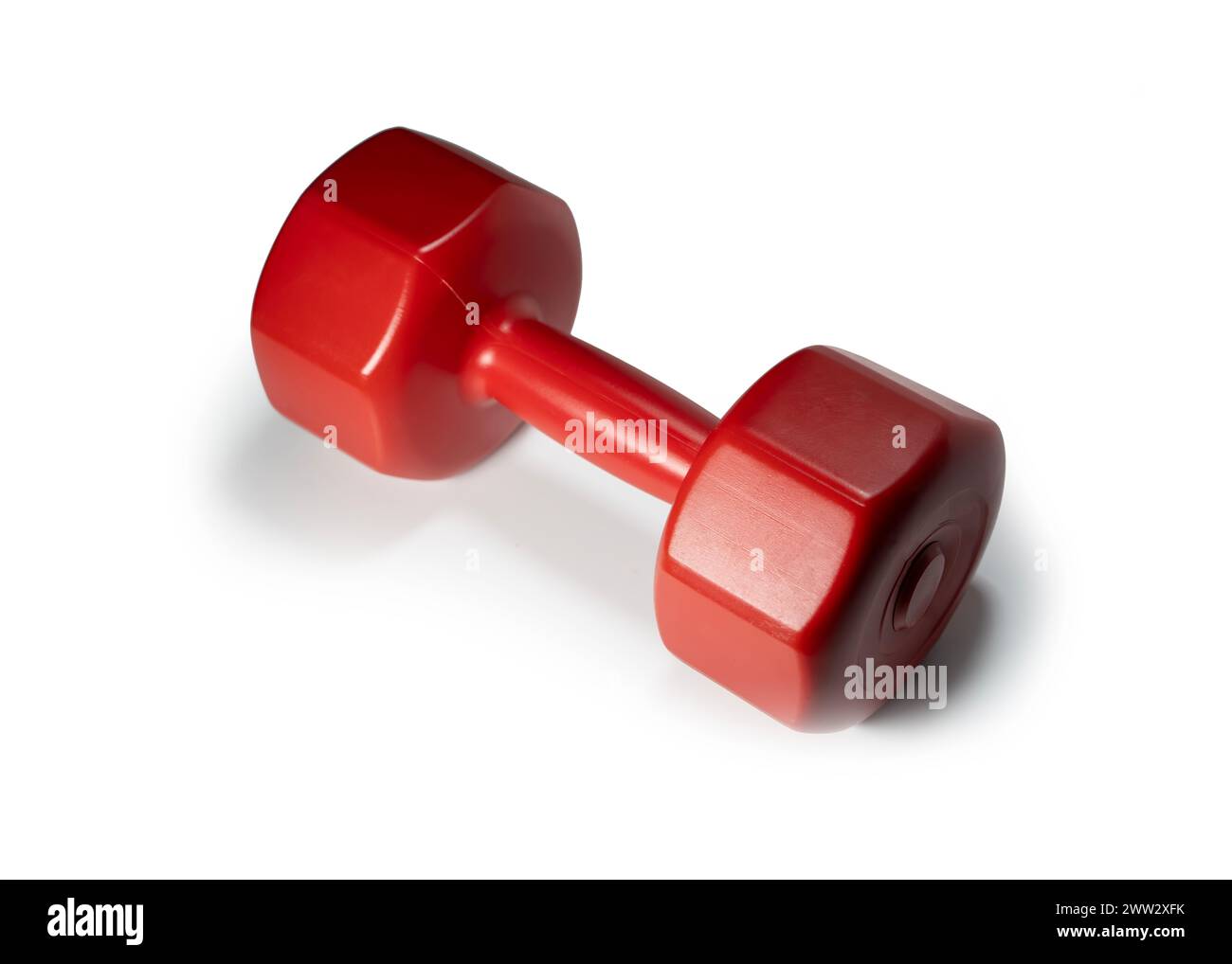 Red Plastic Dumbbell, Isolated On White Surface Stock Photo