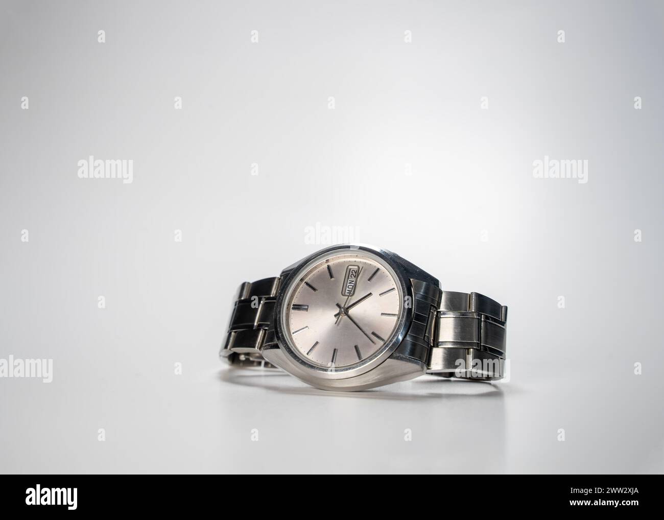 Vintage Automatic Watch, Isolated On Gray Surface Stock Photo