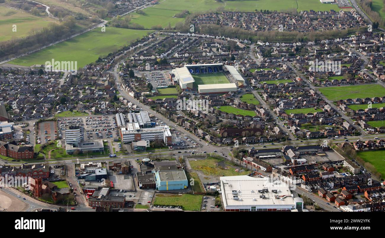 aerial view of Widnes looking west towards the DCBL Stadium, home of the Widnes Vikings Rugby League club, and Riverside College Widnes Stock Photo