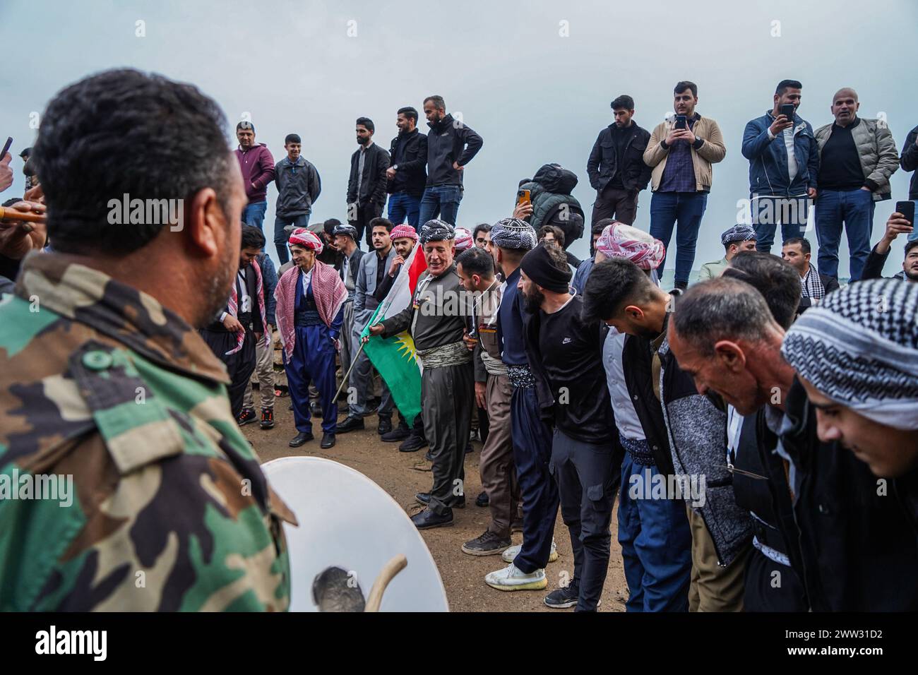 Akre, Iraq. 20th Mar, 2024. Iraqi Kurds dance as they celebrate Nowruz ...