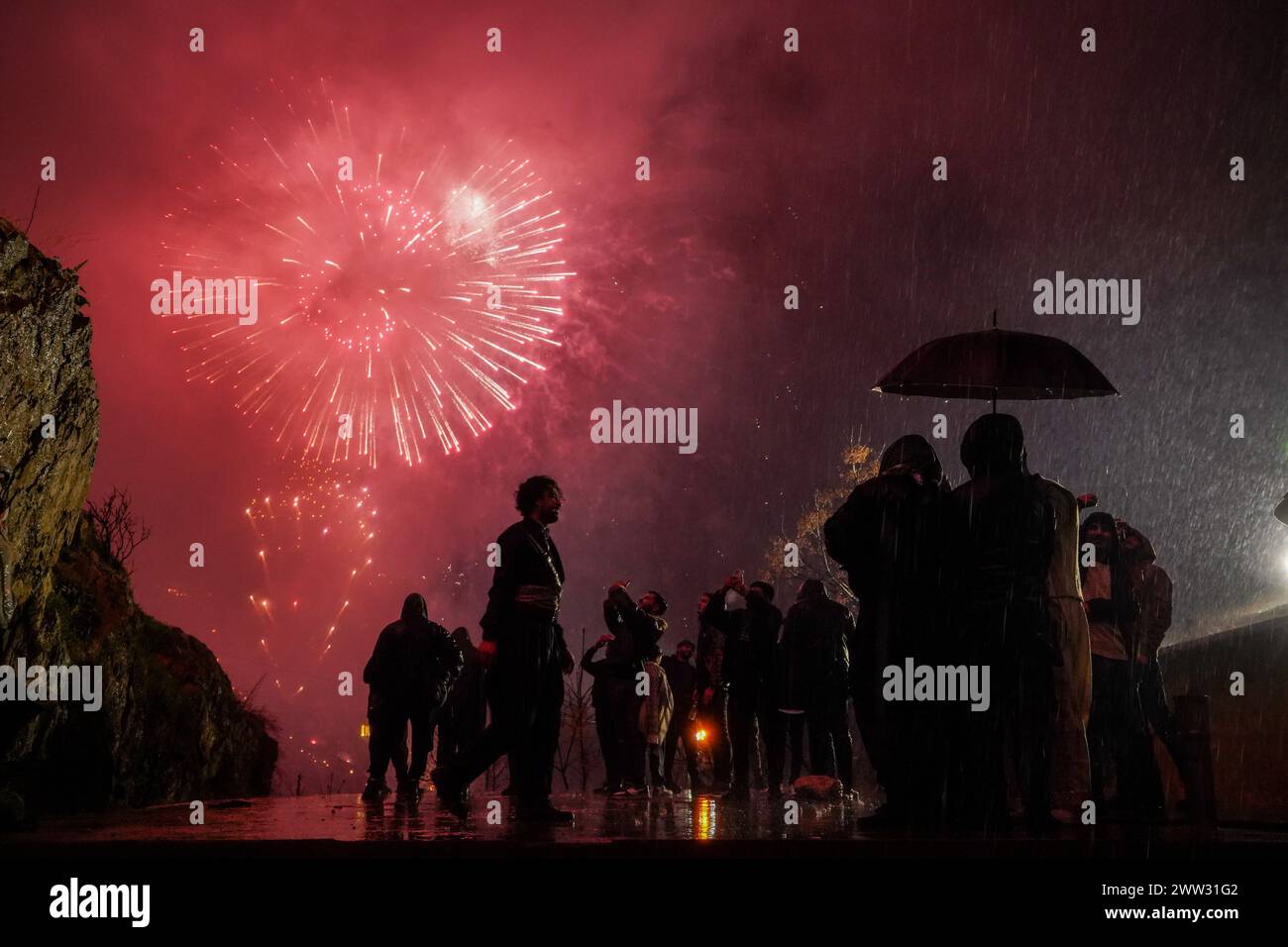Akre, Iraq. 20th Mar, 2024. Fireworks light up the town as Iraqi Kurds ...