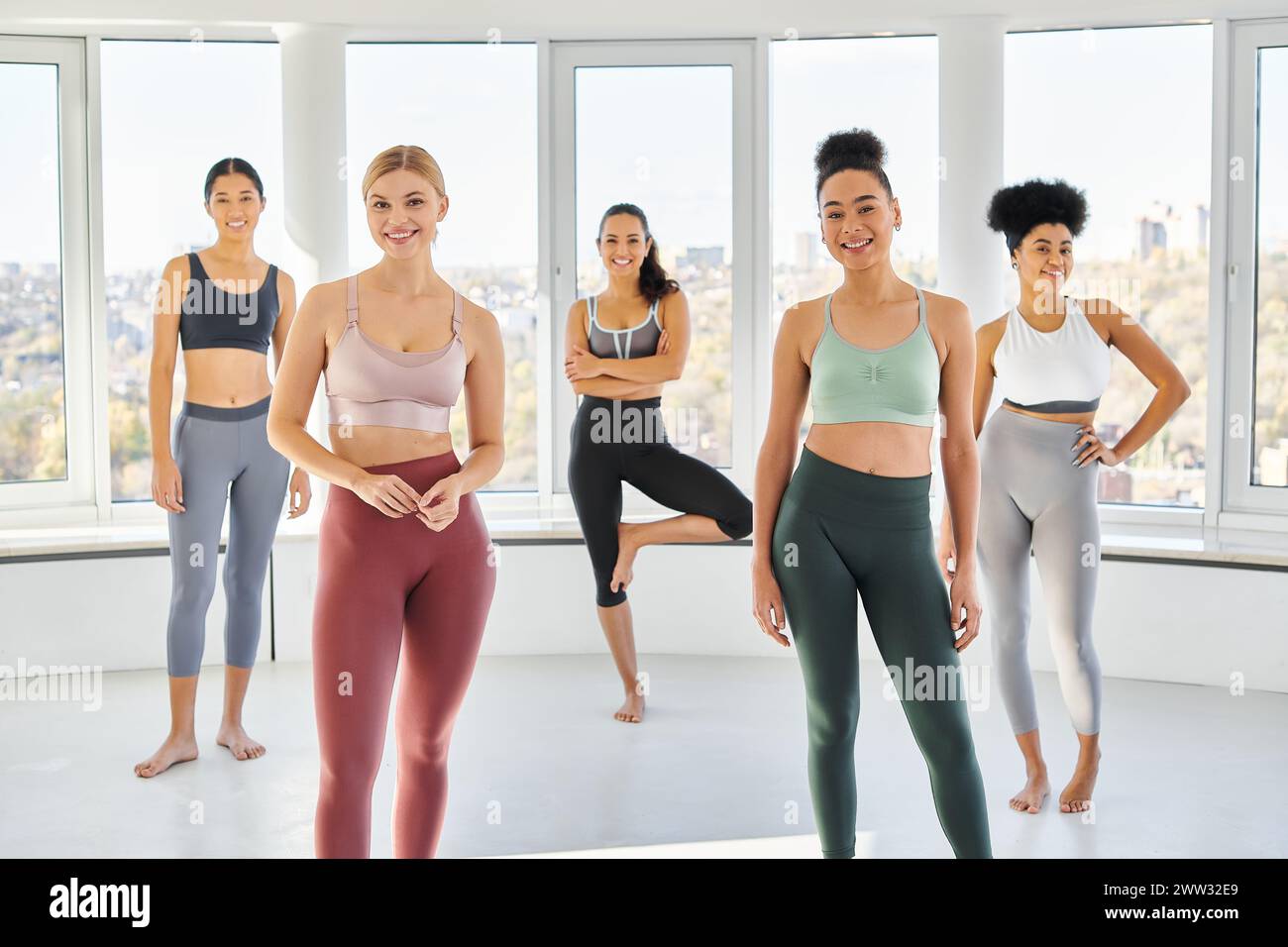 Five women standing in studio hi-res stock photography and images - Alamy