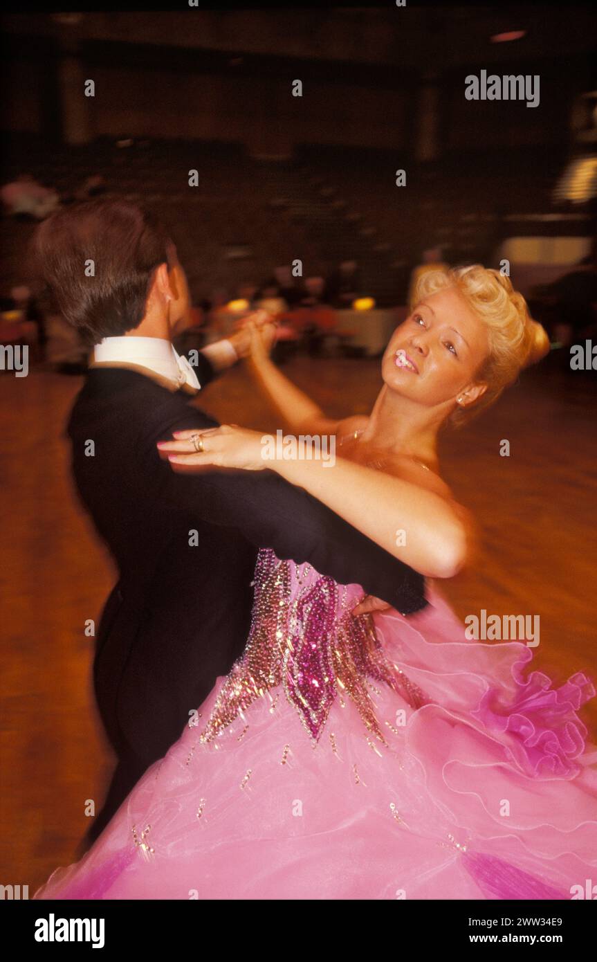 Come Dancing TV 1990s programme contestants quickstep around the dance floor, they are practicing for Come Dancing a British ballroom dancing competition at The Winter Gardens, Empress Ballroom. Blackpool, Lancashire, England 1st February 1991. HOMER SYKES Stock Photo