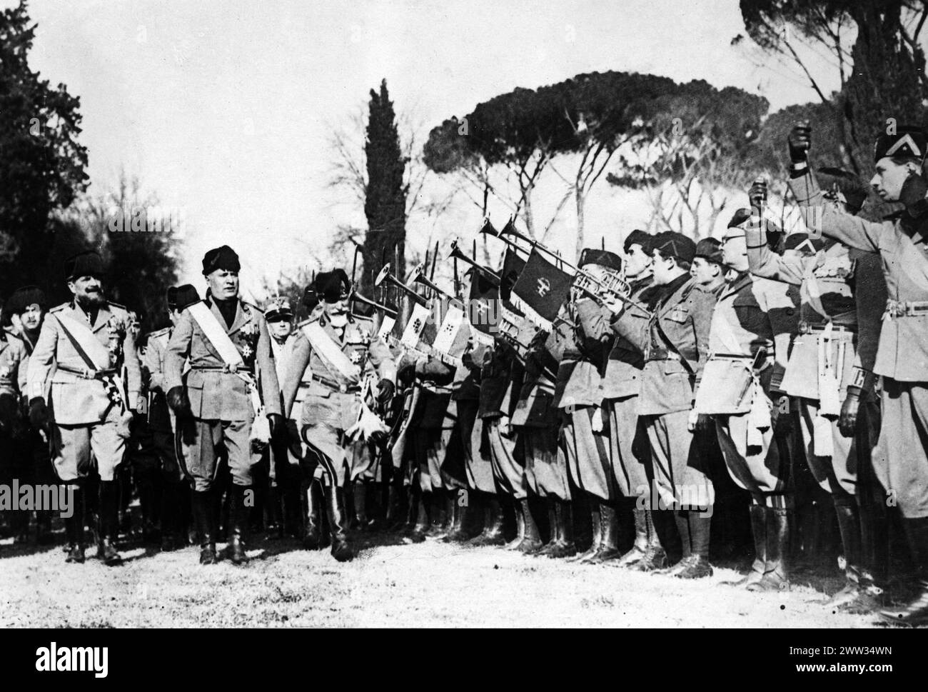 Benito Mussolini (1883-1945) inspecting his troops - World War II Stock Photo