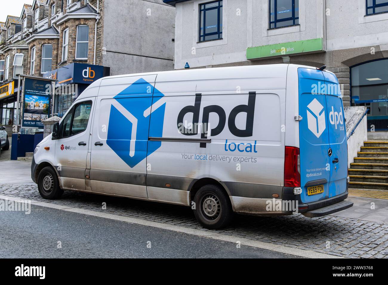 A DPD deliver van parked in Newquay Town Centre in Cornwall in the UK