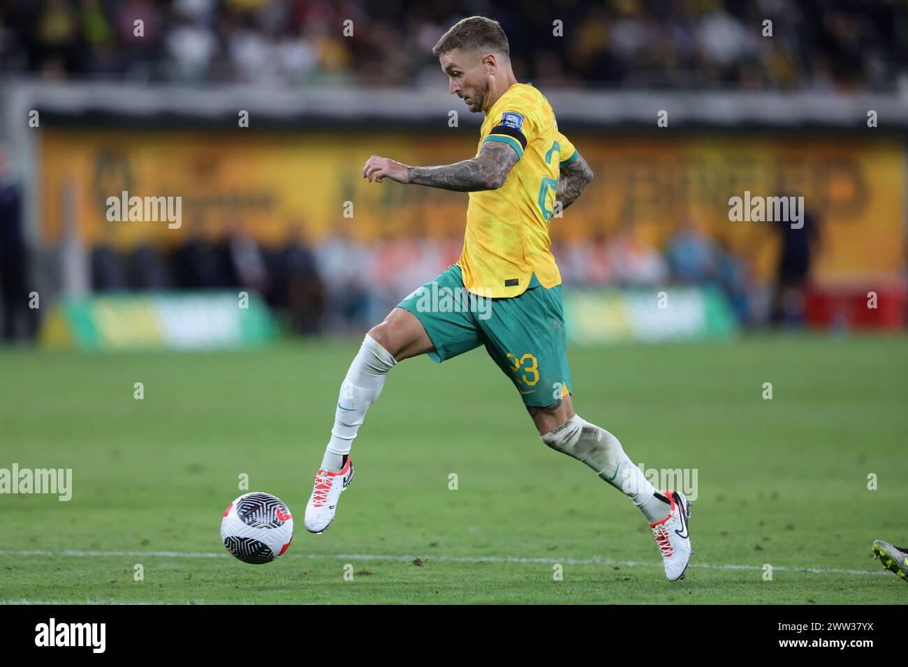 Sydney, Australia. 21st Mar, 2024. Adam Taggart of Australia dribbles the ball during the FIFA World Cup 2026 Qualifying match between Subway Socceroos Australia and Lebanon at the CommBank Stadium, Sydney, Australia on 21 March 2024. Photo by Peter Dovgan. Editorial use only, license required for commercial use. No use in betting, games or a single club/league/player publications. Credit: UK Sports Pics Ltd/Alamy Live News Stock Photo