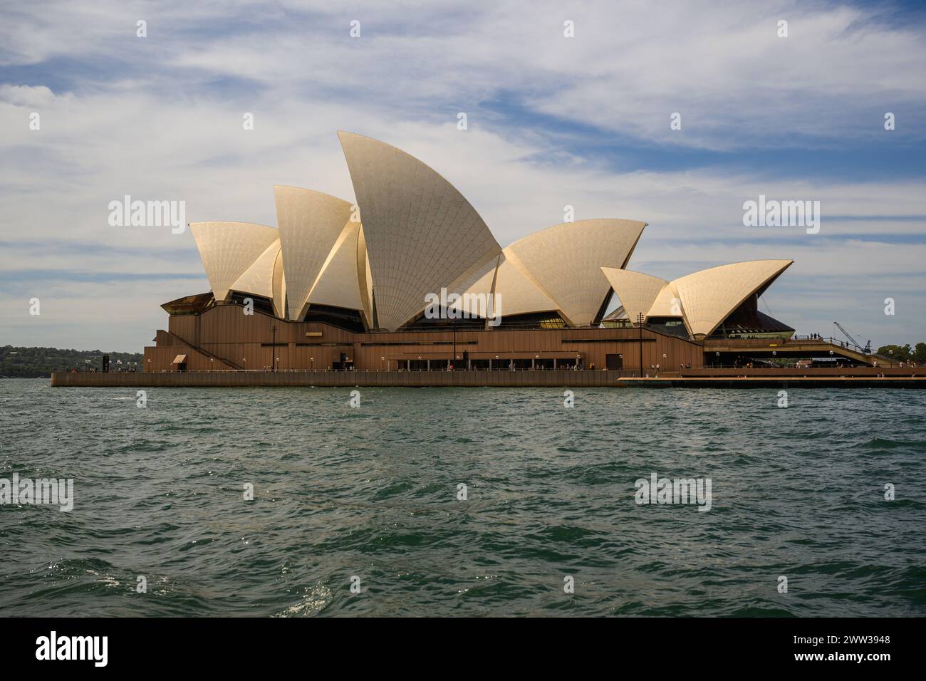 Side view of the Sydney Opera House on a sunny day, Sydney Harbour, Australia Stock Photo
