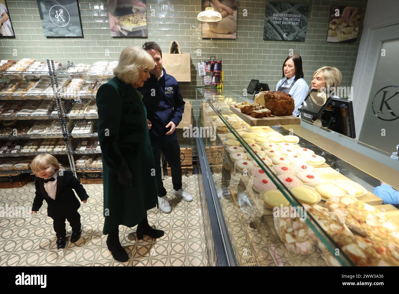 Queen Camilla meets the owner of Knotts Bakery, William Corrie with his