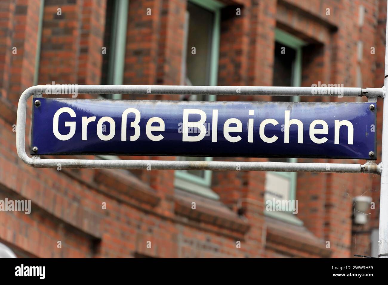A street sign with the inscription 'Grosse Bleichen' on a cloudy day, Hamburg, Hanseatic City of Hamburg, Germany Stock Photo