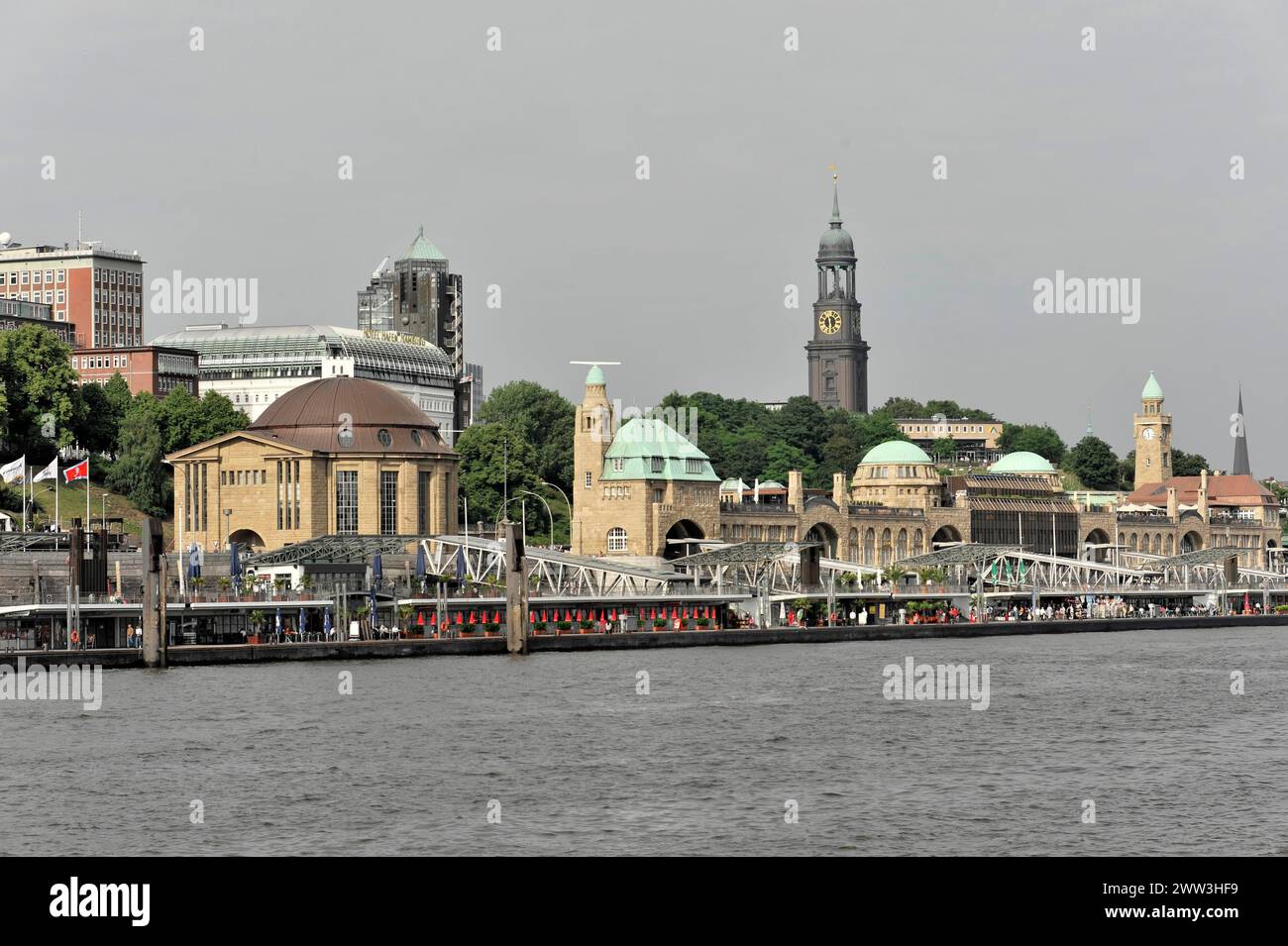 The Hamburg Landungsbruecken with surrounding buildings under a clear sky, Hamburg, Hanseatic City of Hamburg, Germany Stock Photo