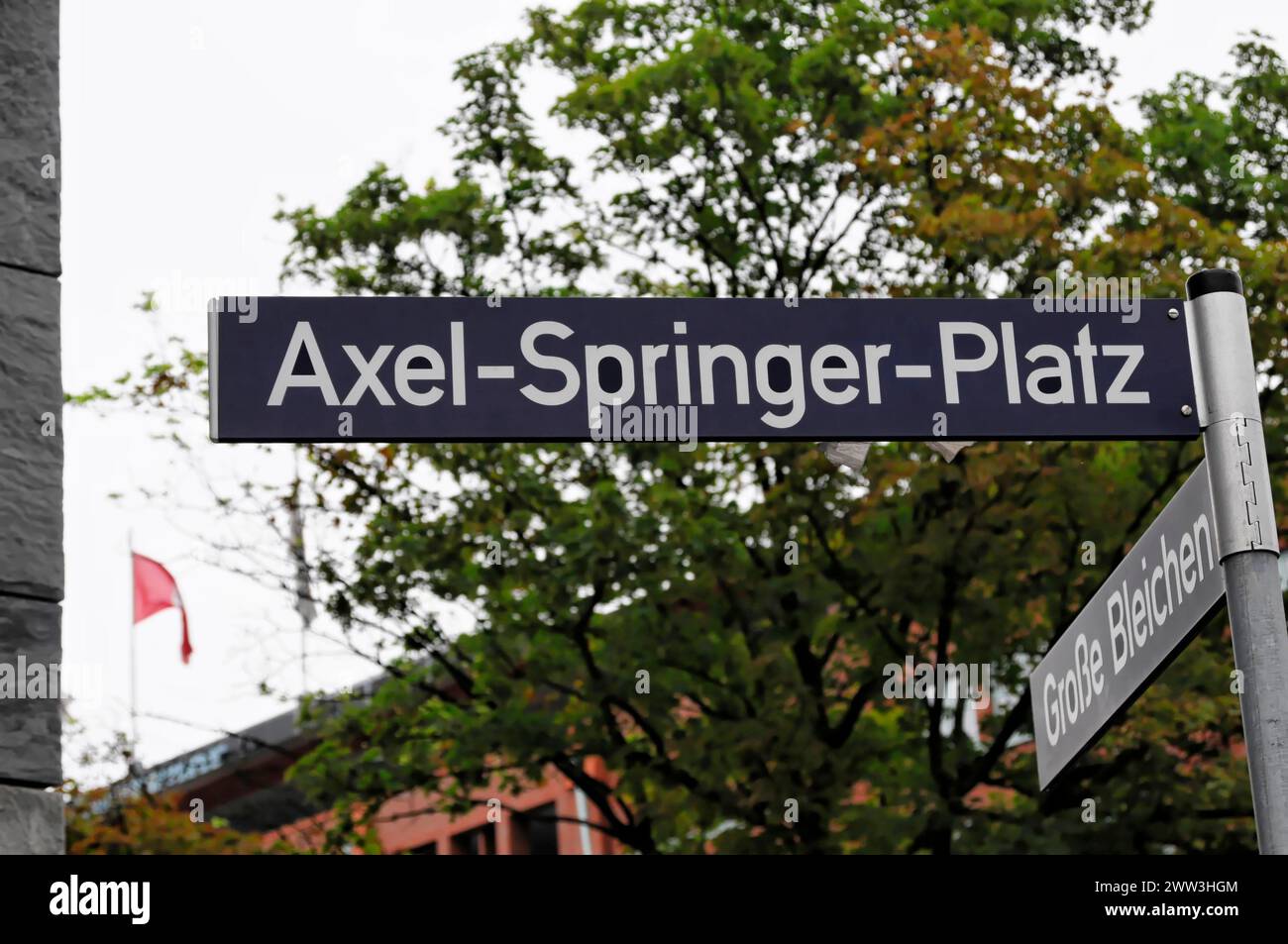 Street sign of Axel-Springer-Platz with trees in the background, Hamburg, Hanseatic City of Hamburg, Germany Stock Photo