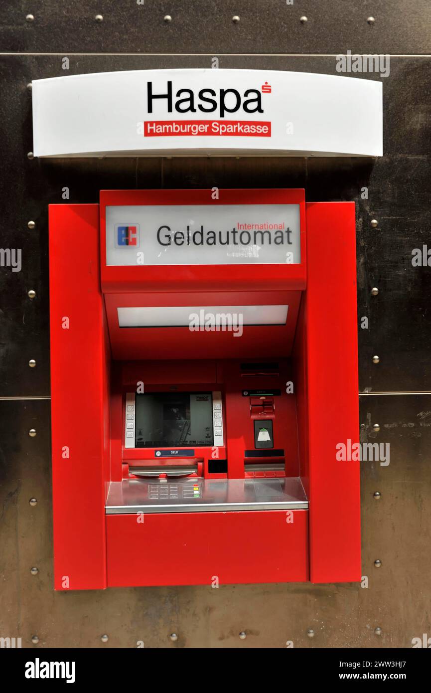 A red Haspa ATM embedded in a wall with a secure appearance, Hamburg, Hanseatic City of Hamburg, Germany Stock Photo