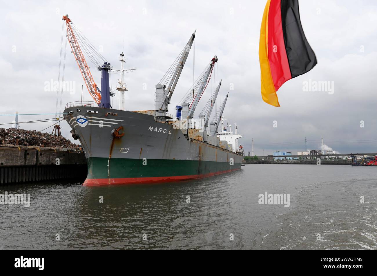 Cargo ship in the grey harbour, Hamburg, Hanseatic City of Hamburg, Germany Stock Photo