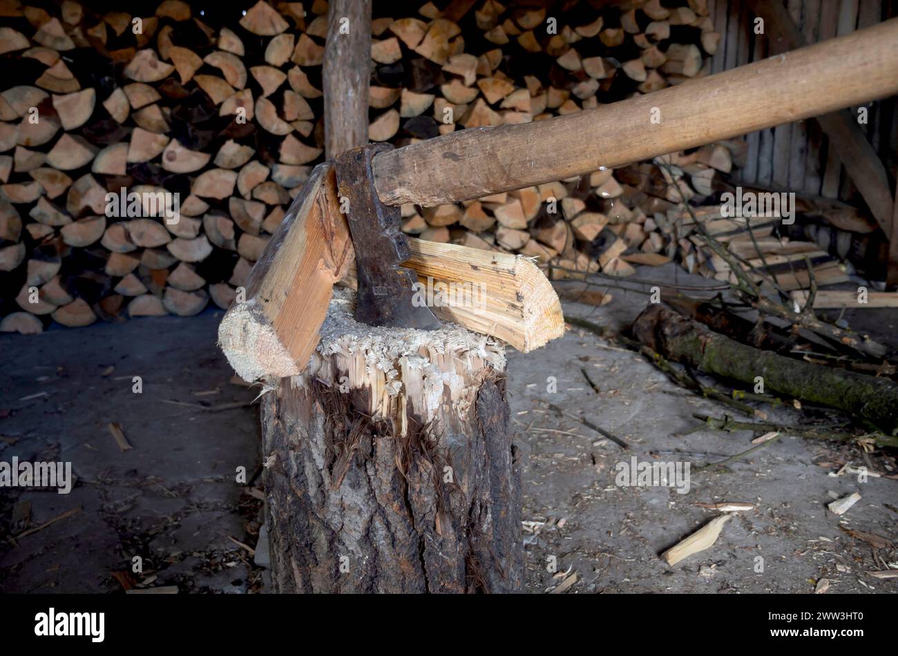 Close shot of axes chopping wood Stock Photo