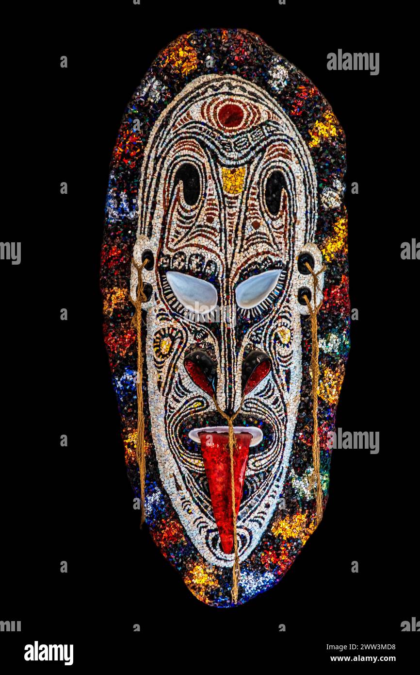 Ritual mask, tribute to the art of the Aborigines, mosaic school producing mosaic masters, Spilimbergo, city of mosaic art, Friuli, Italy Stock Photo