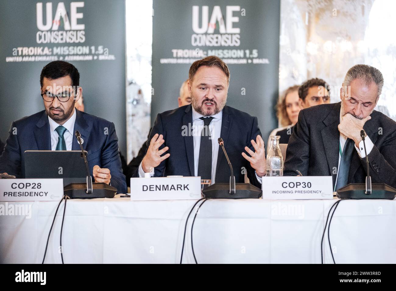 From left: Sultan Ahmed Al Jaber, Minister for global climate policy Dan Joergensen (S), and upcoming COP30 chairman André Aranha Corrêa do Lago. Climate ministers meet at Marienlyst Strandhotel in Helsingoer on Thursday, March 21. Denmark is again this year host for preliminary discussions ahead of this year's climate summit, COP29, in Azerbaijan in November Thursday, March 21, 2024. (Photo: Thomas Traasdahl/Scanpix 2024) Stock Photo