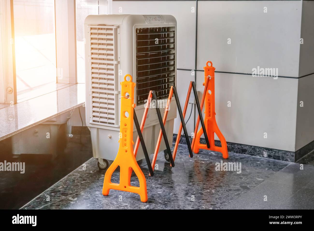 Portable air conditioner or mobile air cooler in modern public place