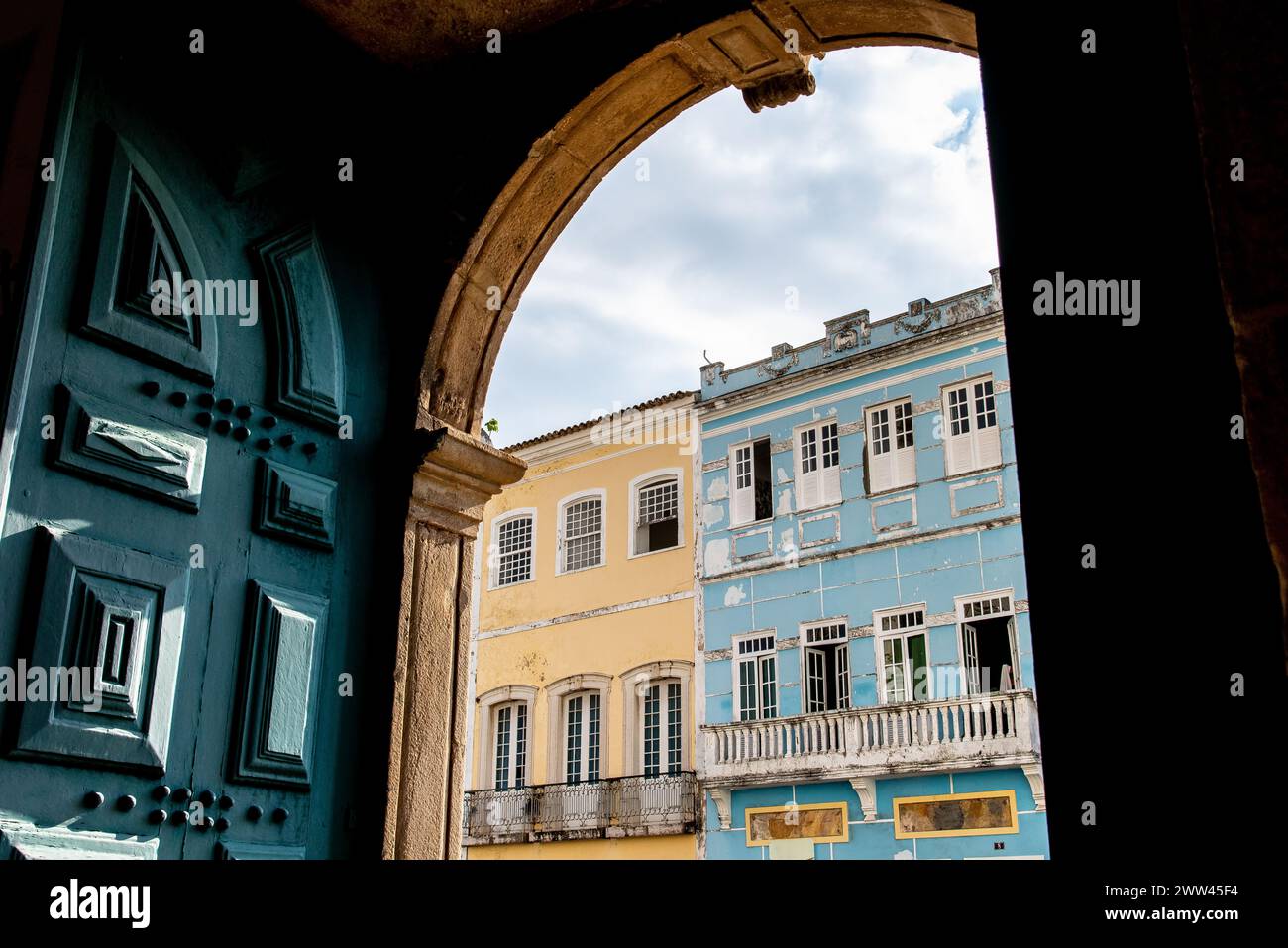 Salvador, Bahia, Brazil - April 19, 2019: View of houses in Pelourinho from inside the Carmo church during Easter Week mass in the city of Salvador, B Stock Photo