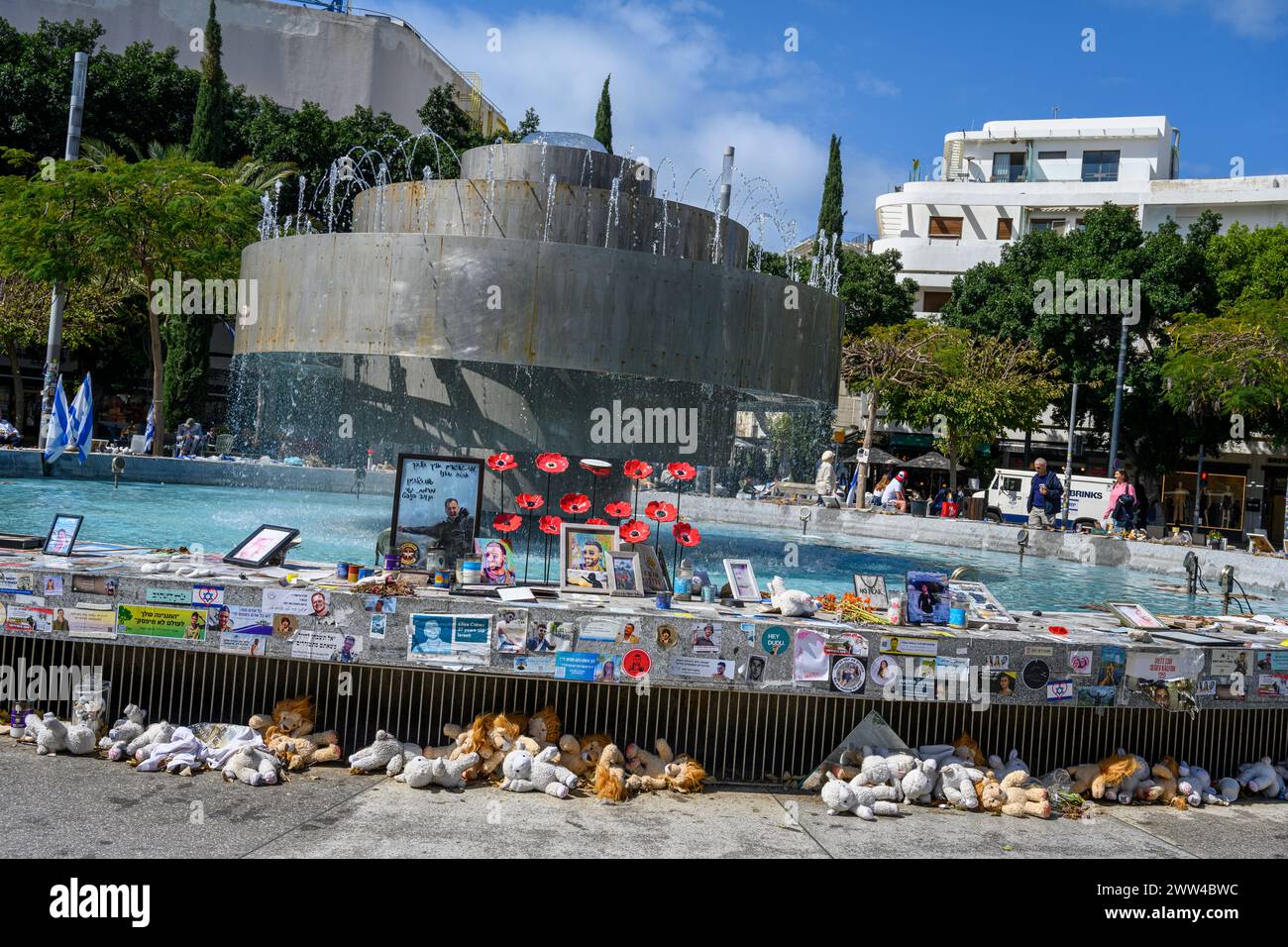 Tel Aviv, Israel - March 4th 2024, Dizengoff Square memorial, gifts and photos of hostages and soldiers killed by Hamas during the October 7, 2023 ter Stock Photo