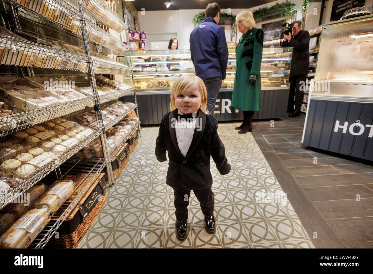 Queen Camilla meets the owner of Knotts Bakery, William Corrie with his