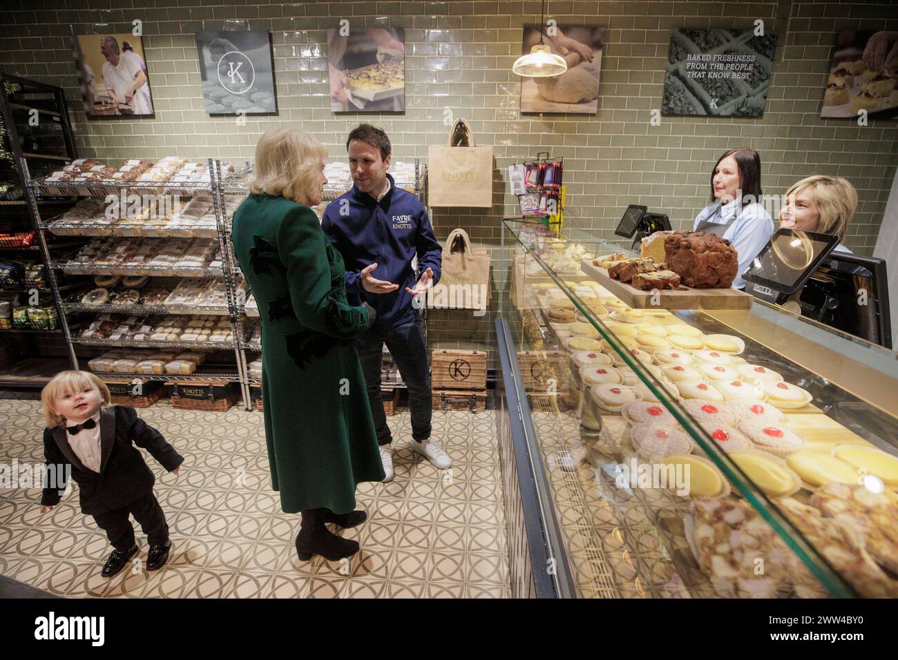 Queen Camilla meets the owner of Knotts Bakery, William Corrie with his