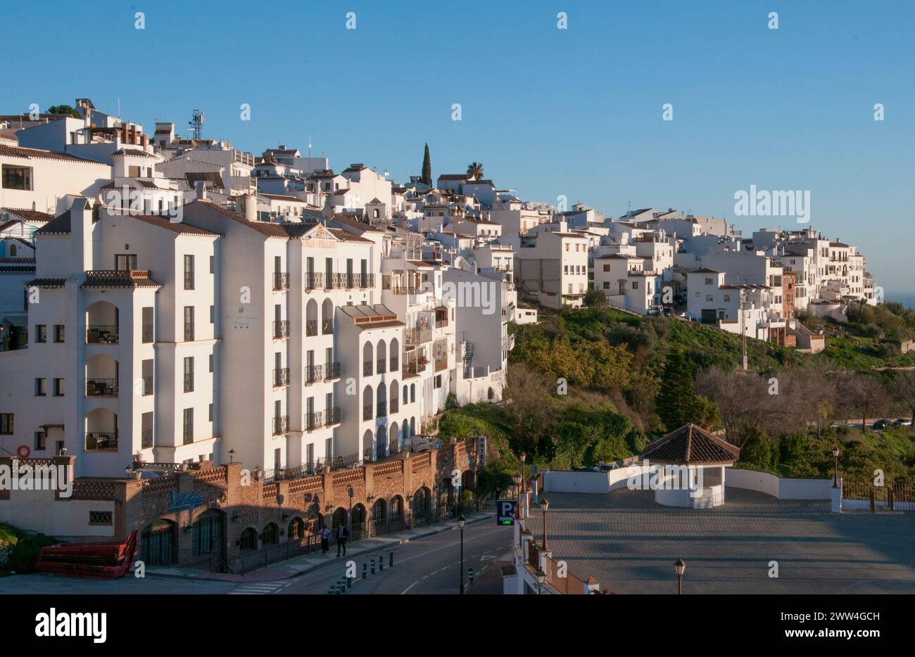 Looking across from the Casco Vieja (Old Town) of Frigiliana to the Casco Nueva or New Town, in the Sierra Almijara ranges of Andalucia, Spain Stock Photo