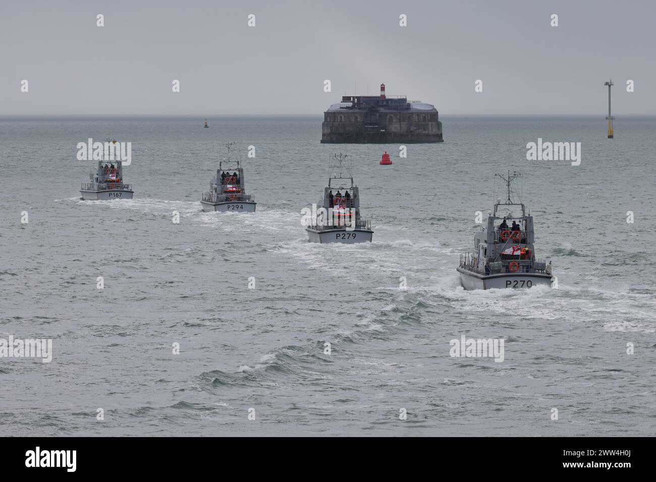 Four Royal Navy patrol boats, HMS EXPLOIT, TRUMPETER, BLAZER and BITER ...