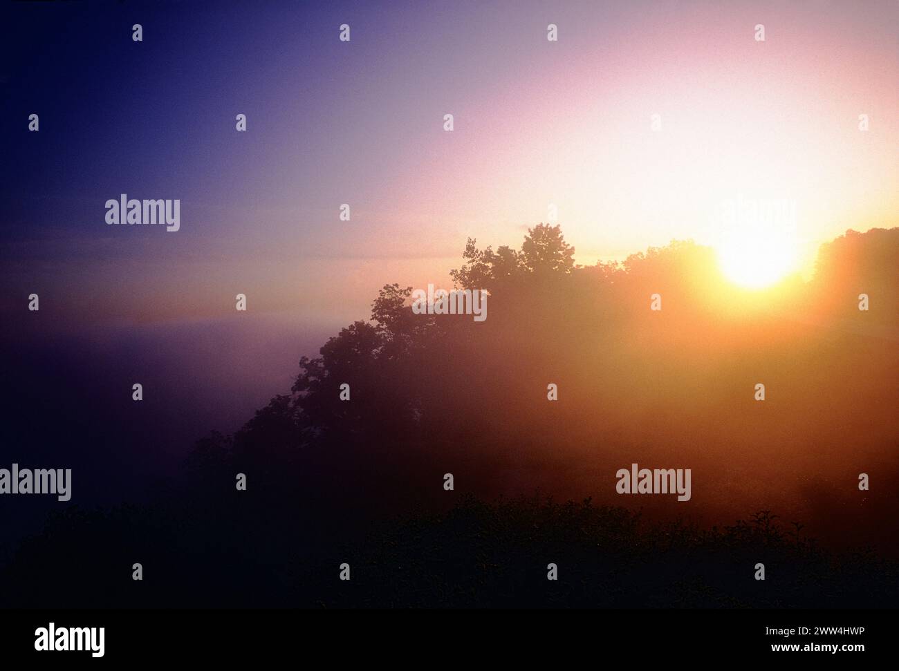 Sun poking through fog; East Brady Overlook; Allegheny River; Clarion County; Pennsylvania; USA Stock Photo