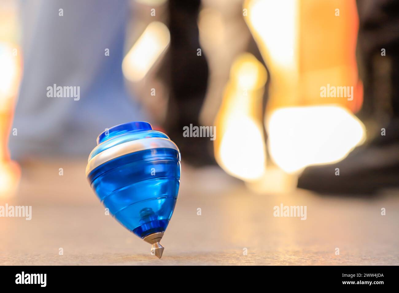 The rope game called Blue Top Rolling on the Floor used by a child ...