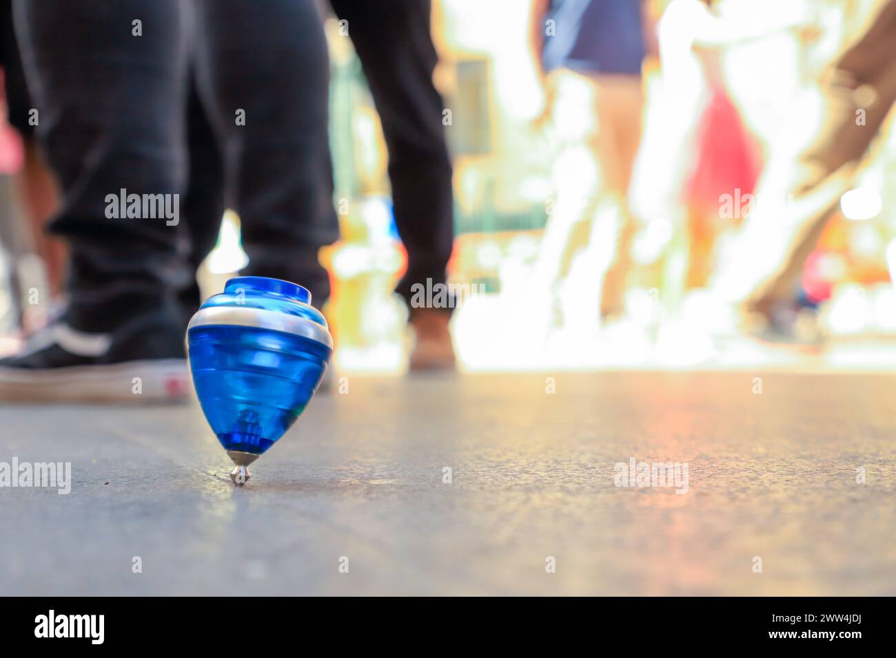 The rope game called Blue Top Rolling on the Floor used by a child ...