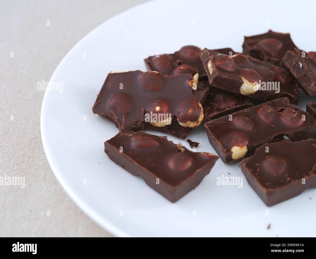 Dark nut chocolate hazelnuts hi-res stock photography and images - Alamy