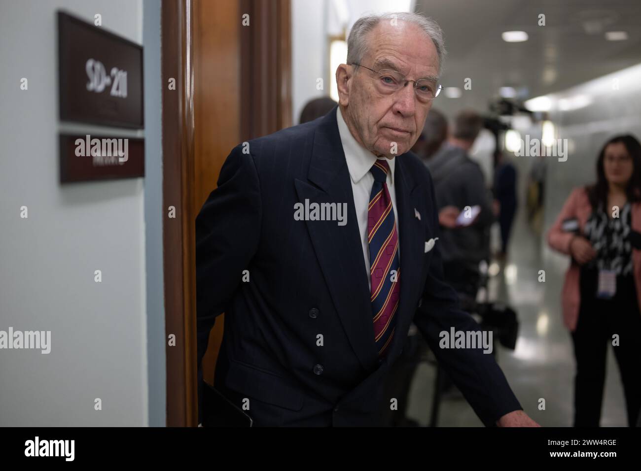 U.S. Senator Chuck Grassley (RIA) walks out of a Senate Finance